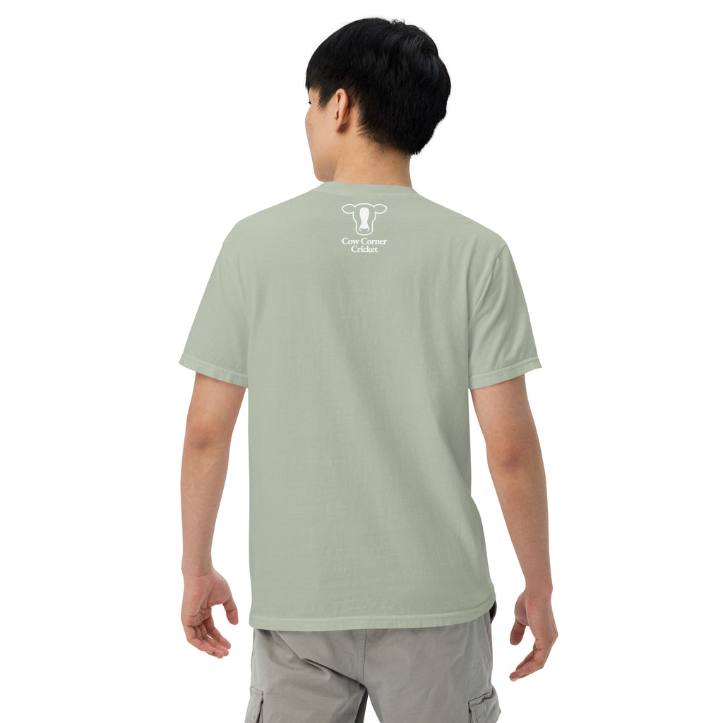Person wearing a light green t-shirt on a white background