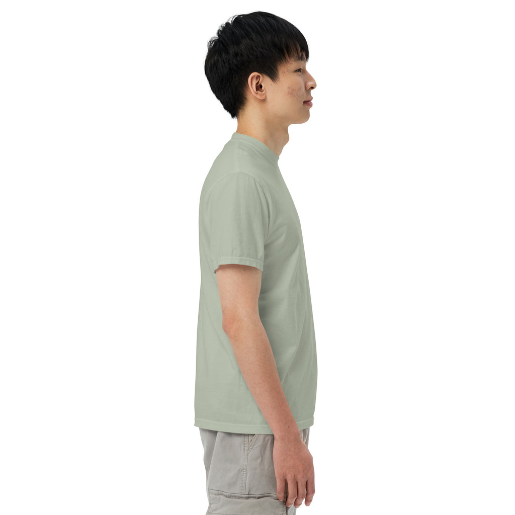 Person wearing a light green t-shirt on a white background