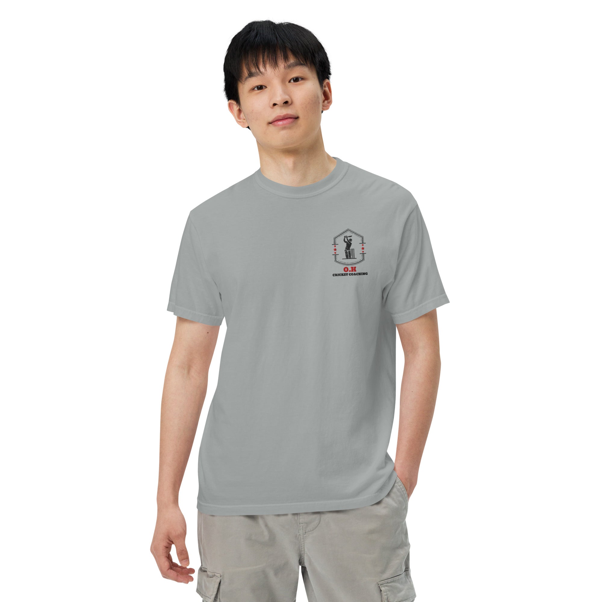 Person wearing a gray t-shirt with 'RAW' logo on a white background