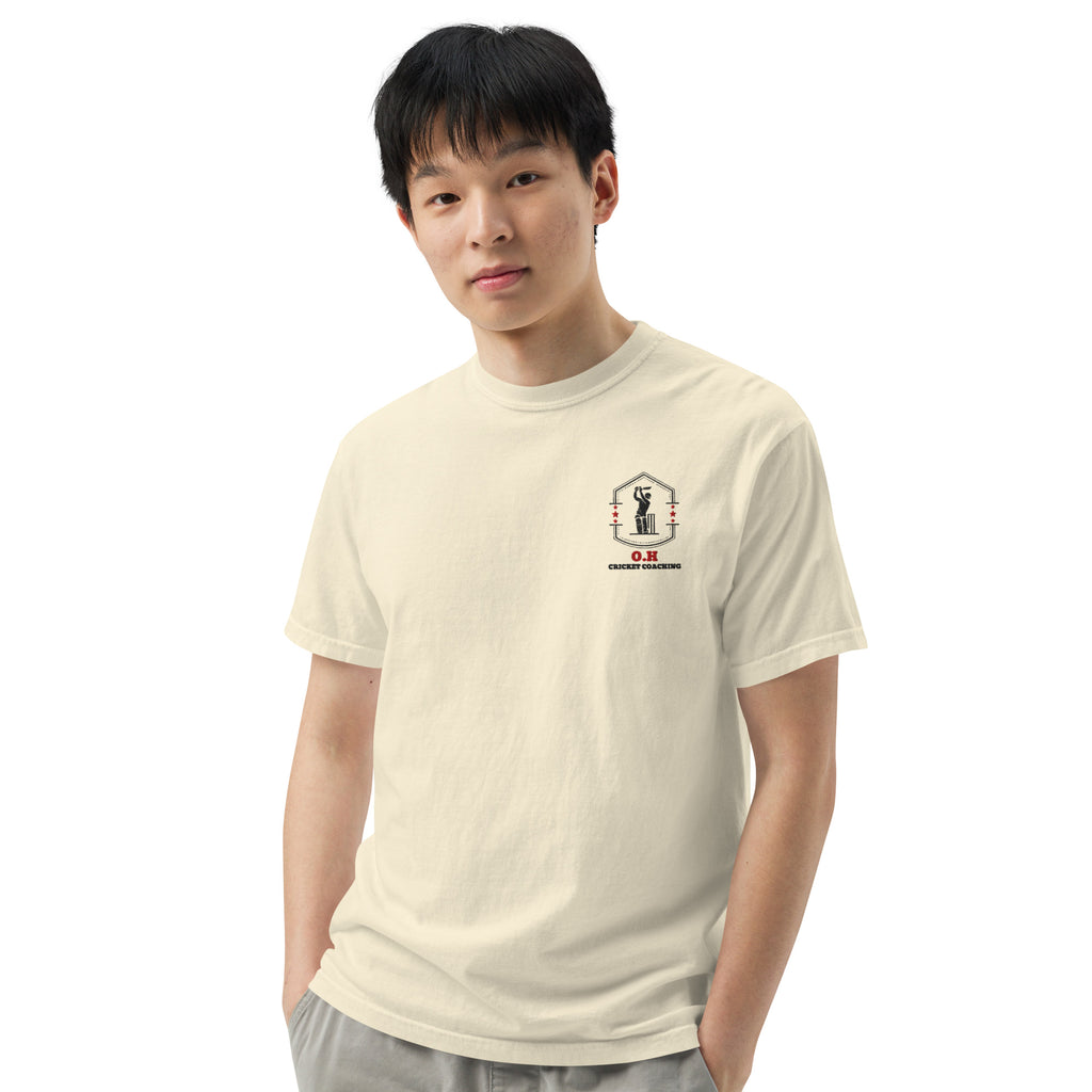 Person wearing a beige t-shirt with 'Motor City' text on a white background