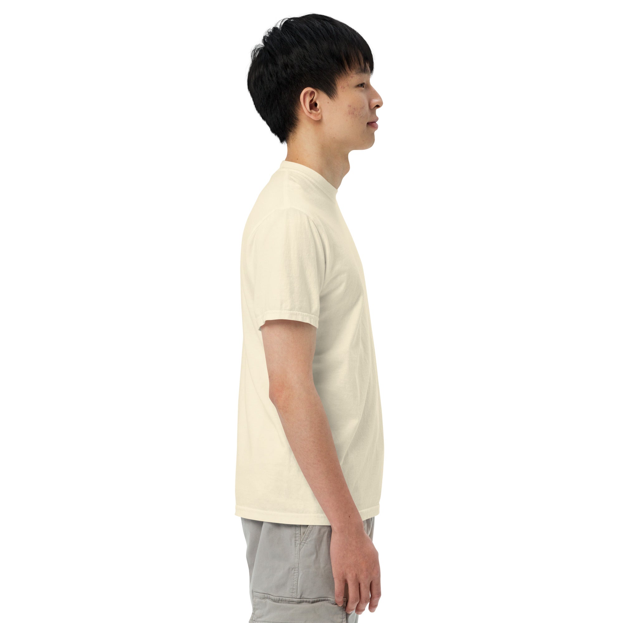 Person wearing a light-colored shirt and light pants on a white background