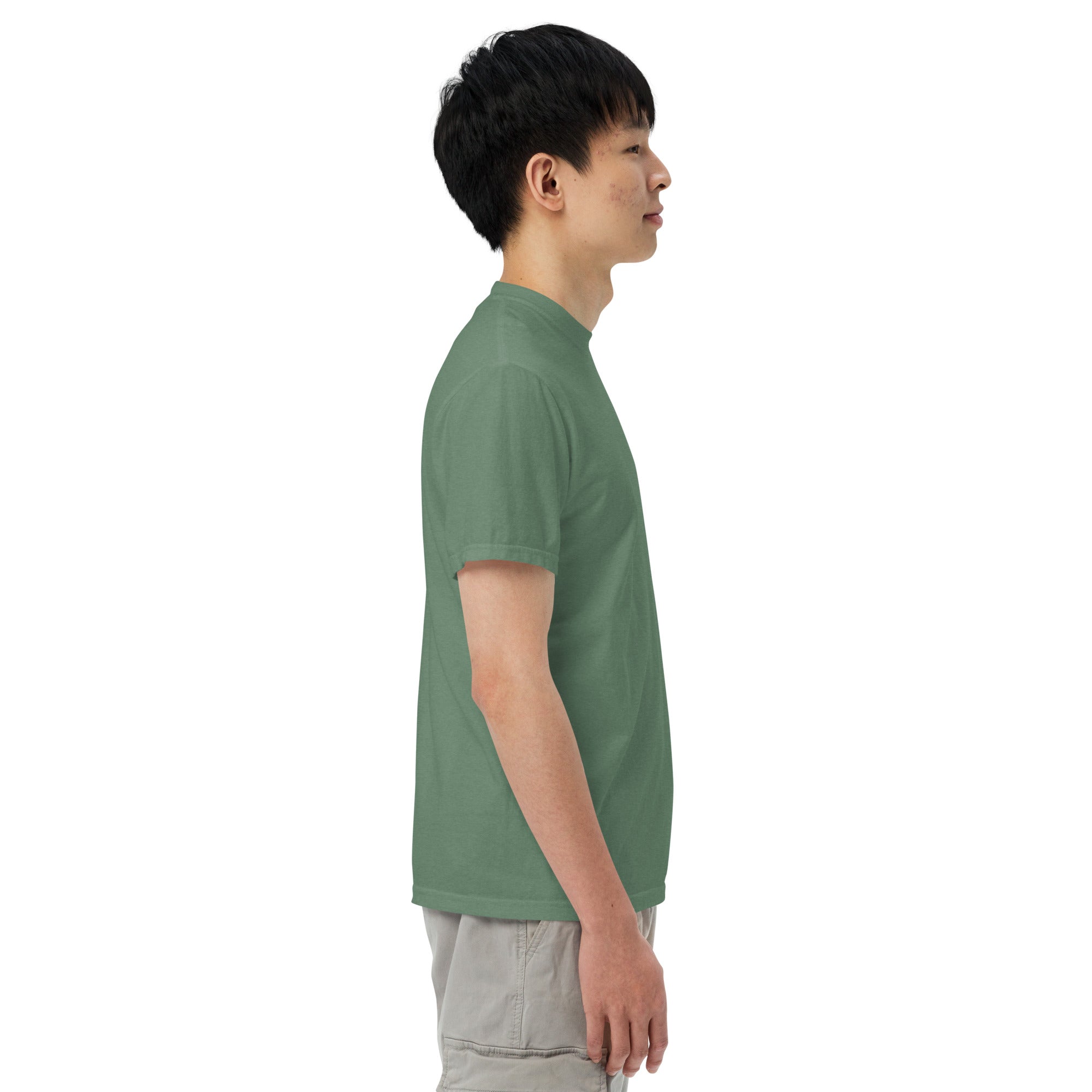 Person wearing a green t-shirt on a white background