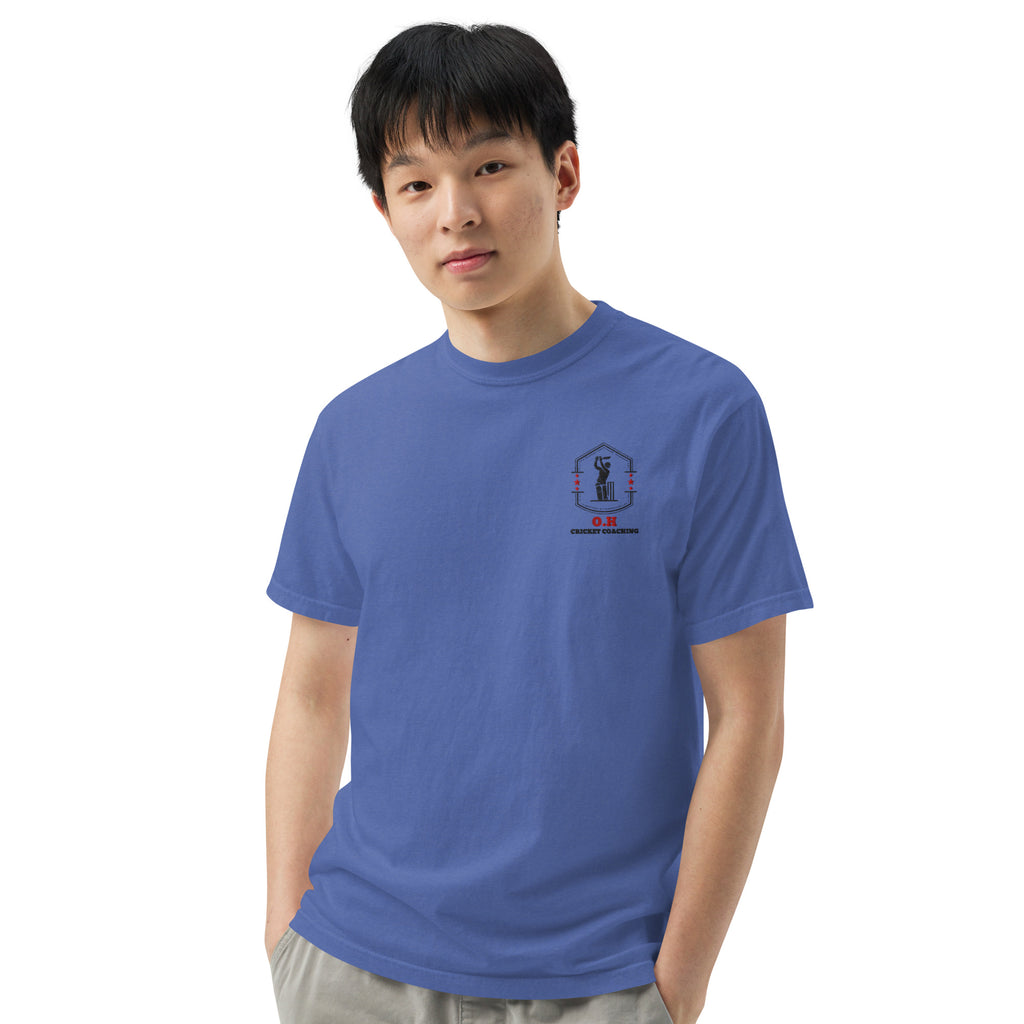 Person wearing a blue t-shirt with a logo on a white background