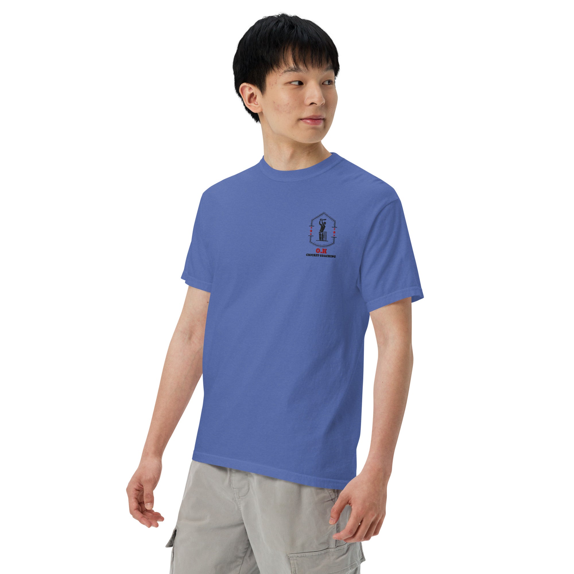 Person wearing a blue t-shirt with text on a white background