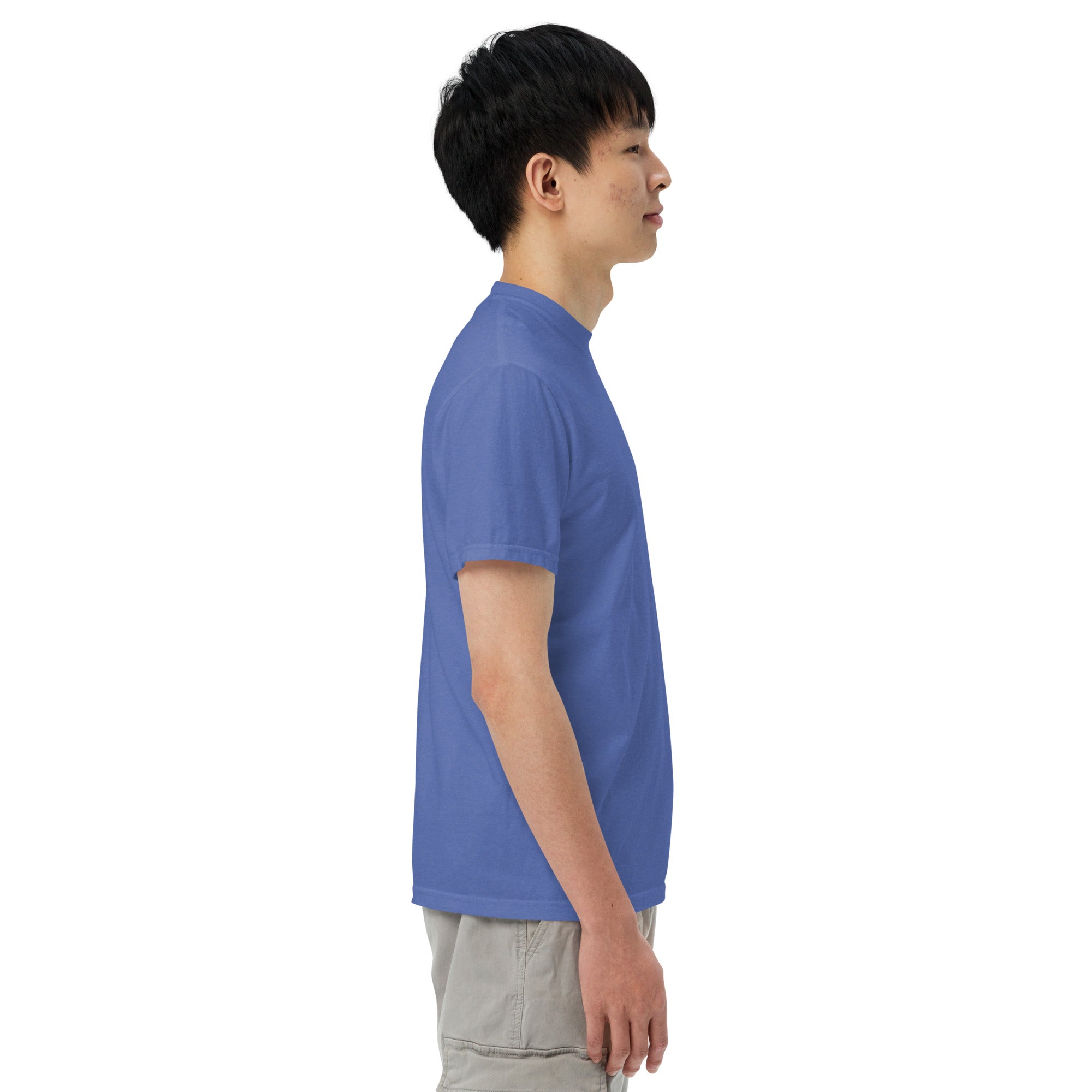 Person wearing a blue t-shirt on a white background