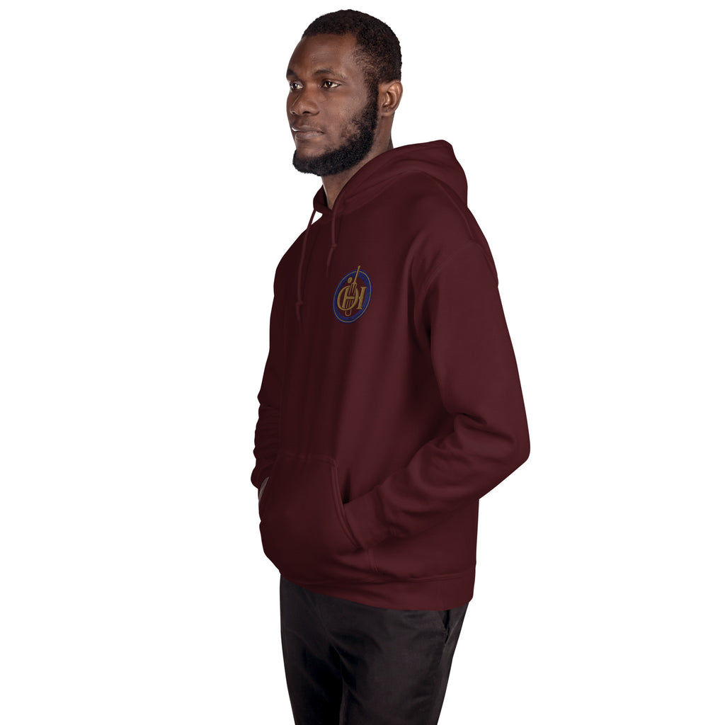 Man wearing a maroon hoodie with a gold logo on a white background