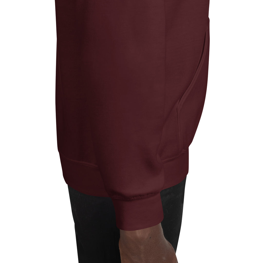 Close-up of maroon pants on a white background