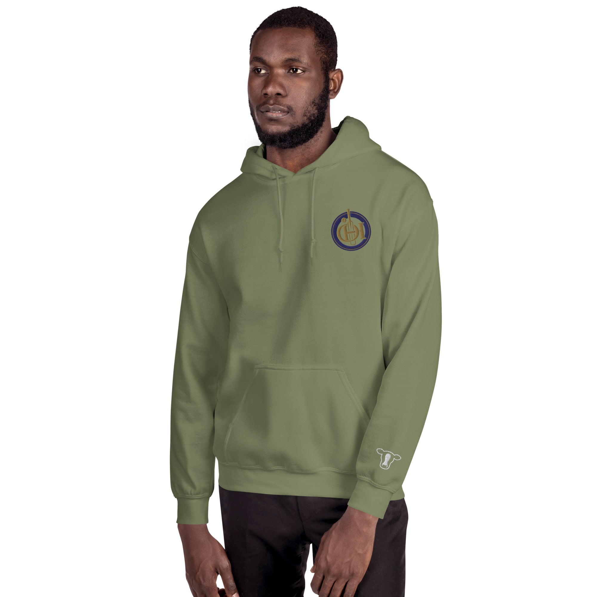Man wearing a green hoodie with a small logo on a white background