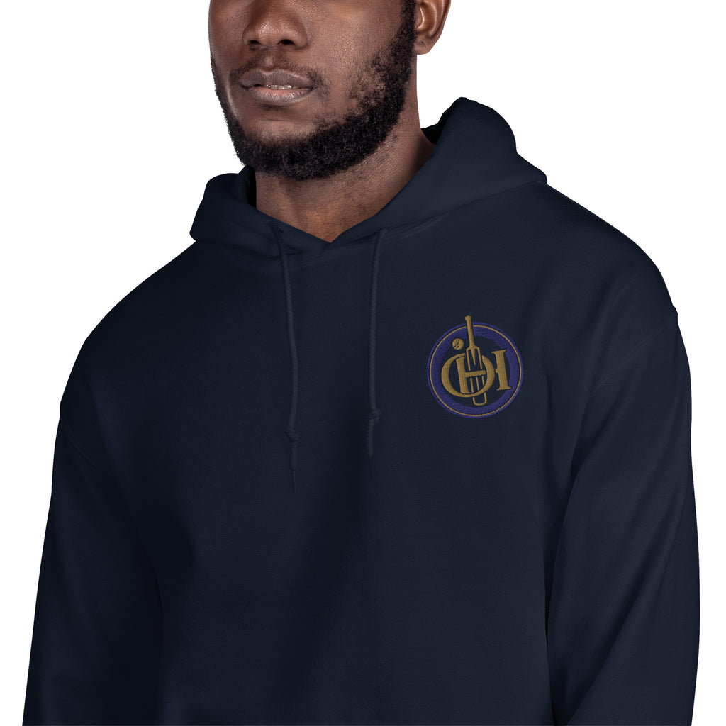 Person wearing a black hoodie with 'MDG' logo on a white background