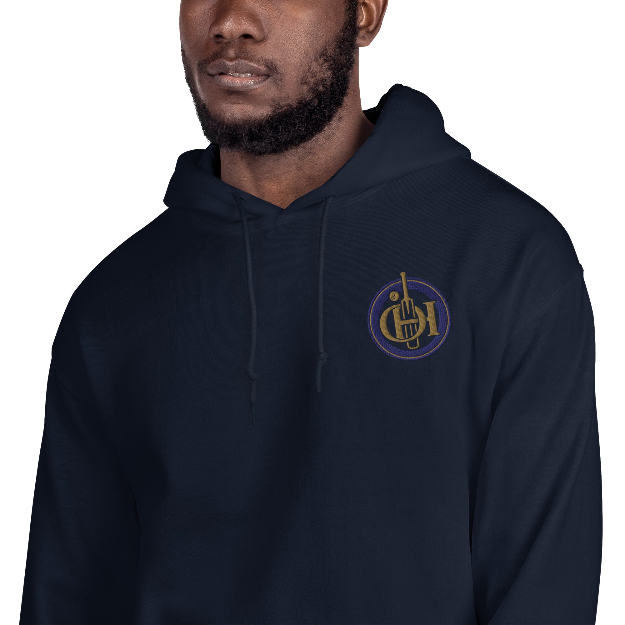 Person wearing a black hoodie with 'MDG' logo on a white background