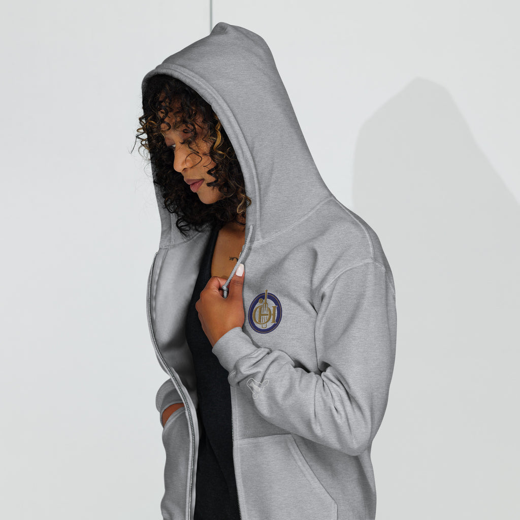 Person wearing a gray hoodie with a white background